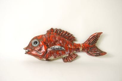 Jacquemart. Deux poissons en céramique vernissée...