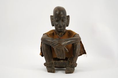 Sculpture Africaine. Chasseur assis, Dogon....