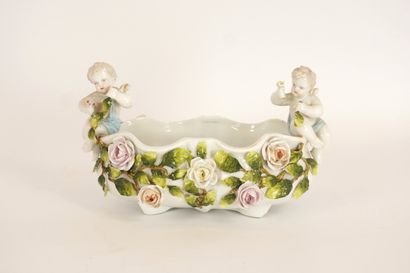 Porcelain center or middle table, cherubs...