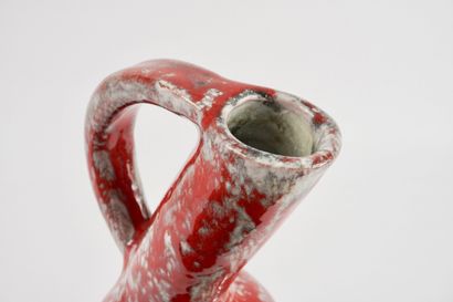 Roux workshop. Ceramic pitcher with red drips....