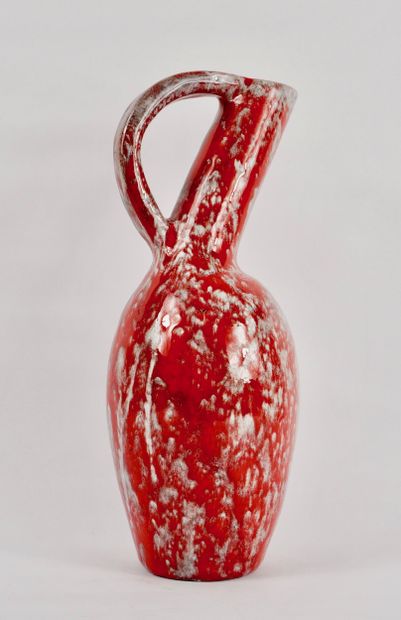 Roux workshop. Ceramic pitcher with red drips....