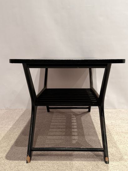 Années 1960. Table de salon ou table basse.
Probablement...