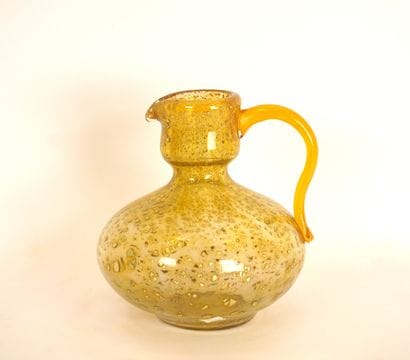 DAUM. Pitcher in yellow bubble glass glittered...
