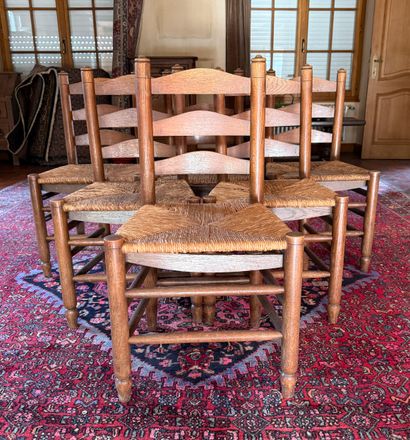 6 chaises en chène fond paillé. Dans l'esprit...
