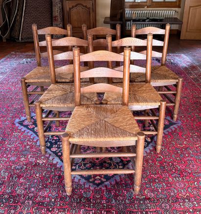 6 chaises en chène fond paillé. Dans l'esprit...