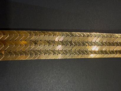 Bracelet en or jaune 750/°°°.
Maille chevron.
Or...
