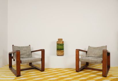 Pair of seats in exotic wood. Closer to the...