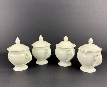 4 white porcelain creamers. 26016-20. Three...