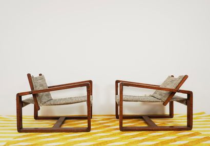 Pair of seats in exotic wood. Closer to the...
