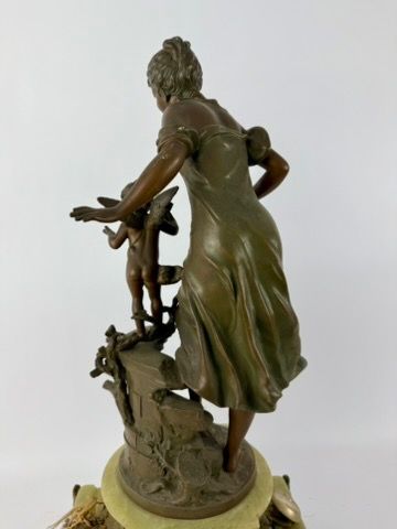 Large mantelpiece: a clock and a pair of...