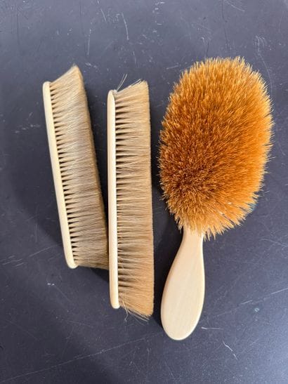 Three dress brushes. N° 26016- 73.
Three...