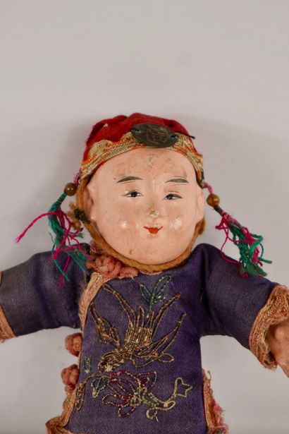Dolls. Two antique dolls. 
One from Asia...
