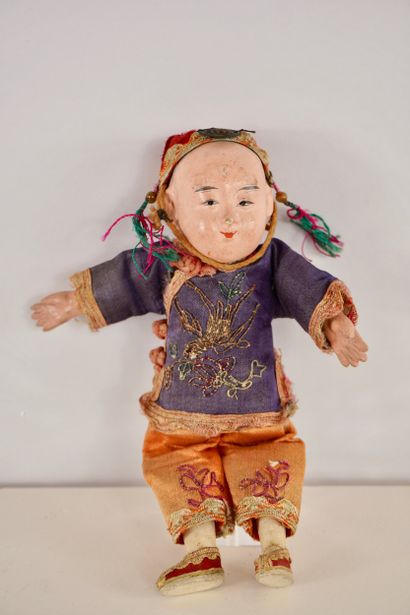 Dolls. Two antique dolls. 
One from Asia...