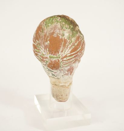 Terracotta figure head mounted on Plexiglas....