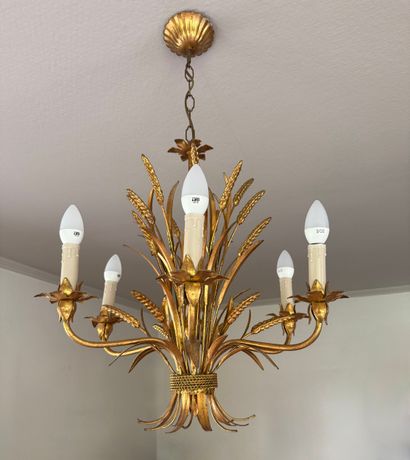 Small chandelier in gilded sheet metal.
Height...