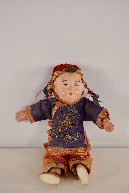 Dolls. Two antique dolls. 
One from Asia...