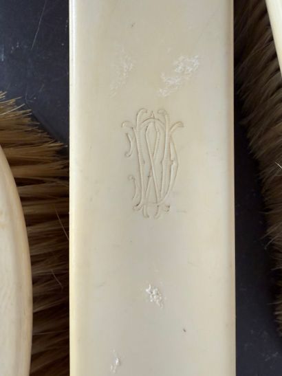 Three dress brushes. N° 26016- 73.
Three...