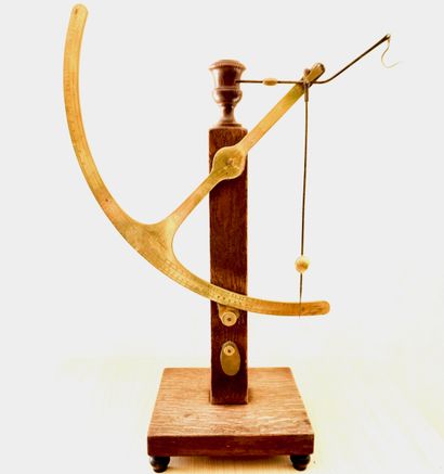 Brass scientific object. Probably a bala...