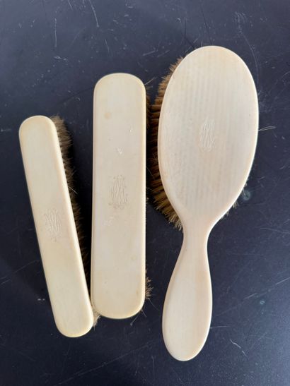 Three dress brushes. N° 26016- 73.
Three...