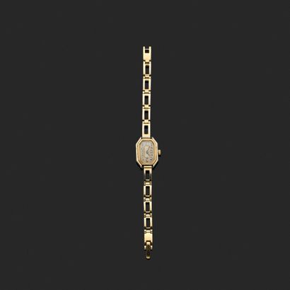 Montre de dame en métal et or jaune et gris...