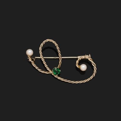 Braided brooch in 18K (750°°°) yellow and...