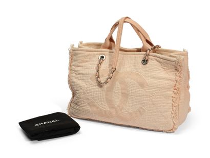 CHANEL
Large powder pink tote bag in monogrammed...