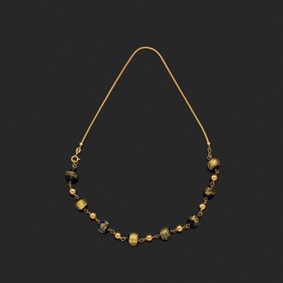 Necklace in 18K (750°°°) yellow gold adorned...