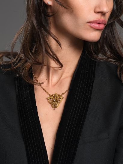 Collier en or jaune 18K (750°°°) et argent...