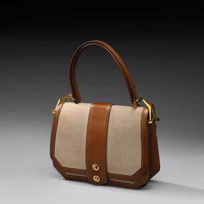 HERMÈS Paris 
Rare Courchevel Gold canvas...