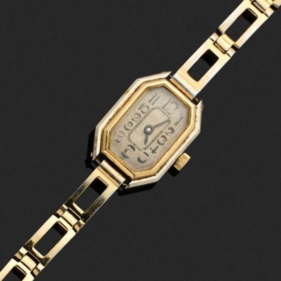 Montre de dame en métal et or jaune et gris...