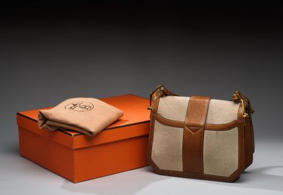 HERMÈS Paris 
Rare Courchevel Gold canvas...