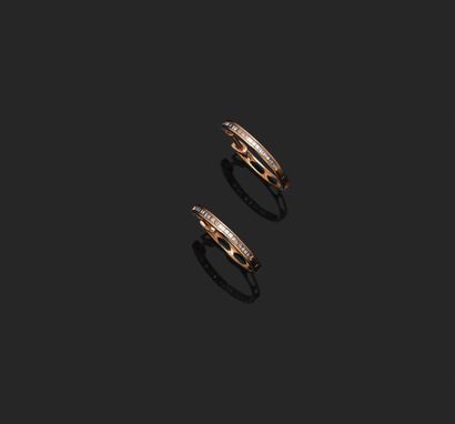 Pair of small hoop earrings in 18K (750°°°)...