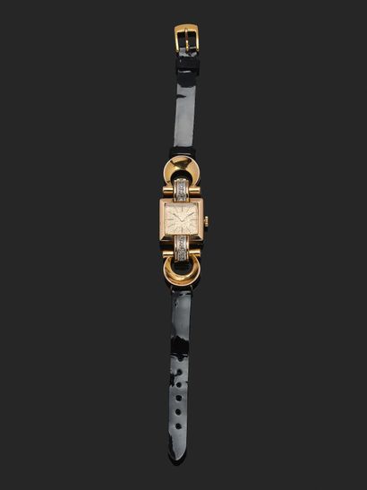 Montre de dame tank en or jaune 18K (750°°°...