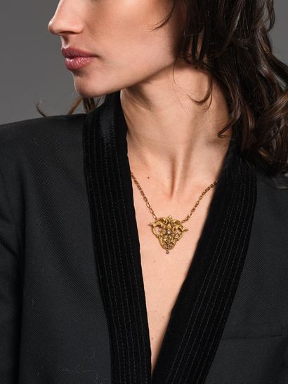 Collier en or jaune 18K (750°°°) et argent...
