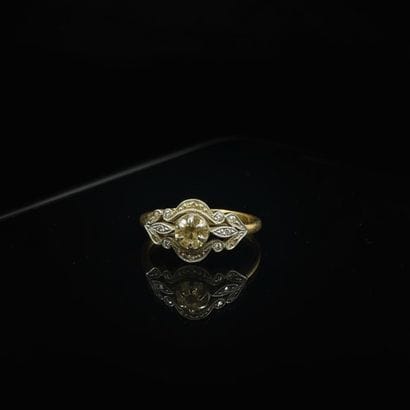 Bague duchesse en or jaune et gris 18K (750°°°...