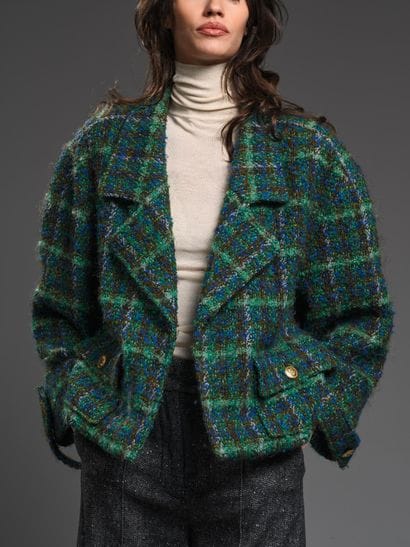 CHANEL
1980s.
Mottled blue-green jacket....