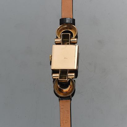 Montre de dame tank en or jaune 18K (750°°°...