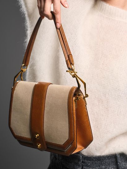 HERMÈS Paris 
Rare Courchevel Gold canvas...