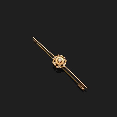 Petite broche en or rose 14K (585°°°) et...