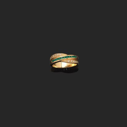 Gilded metal band ring set with small diamonds...