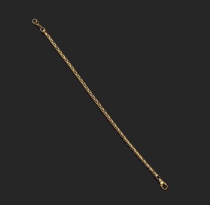 18K (750°°°) yellow gold palm link bracelet.

Net...