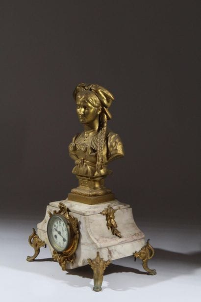 Four-legged marble and gilded metal clock...