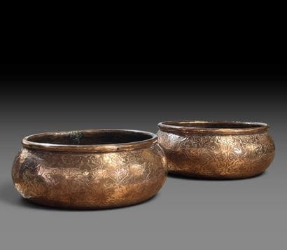 A pair of two circular copper-plated brass...