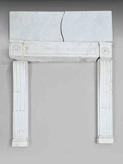 Cheminée d'époque Louis XVI en marbre blanc

Haut....