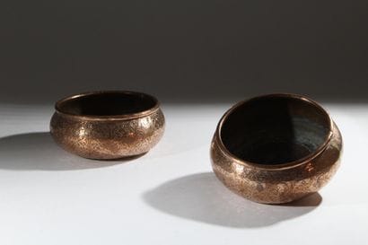 A pair of two circular copper-plated brass...