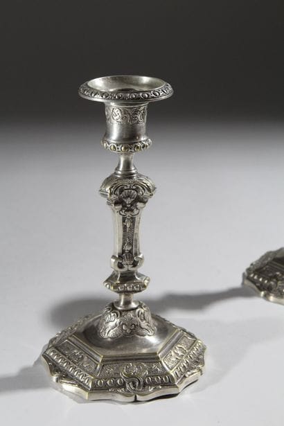 Pair of silver-plated, chiseled bronze candlesticks...