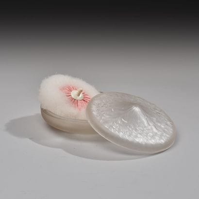 Reunion of four pressed glass poudriers including...