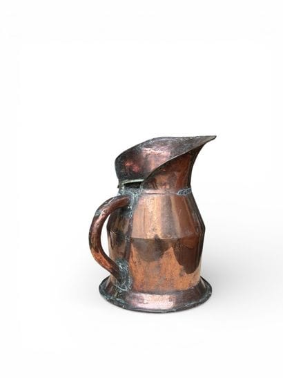 Large copper pitcher.
19th century