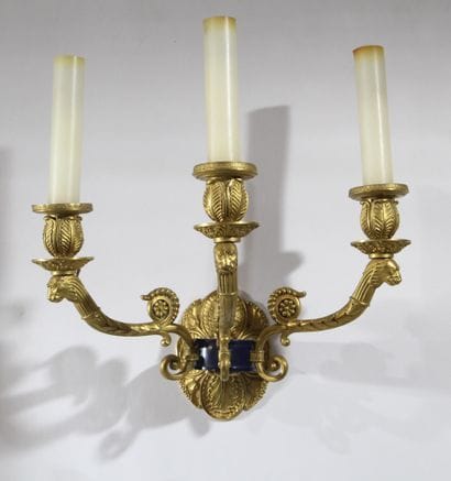 Pair of three-arm wall sconces in gilded,...