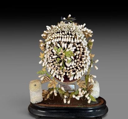 Bridal wreath under a glass dome. 

Height:...